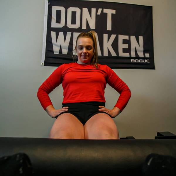 Woman performing a leg exercise during her workout